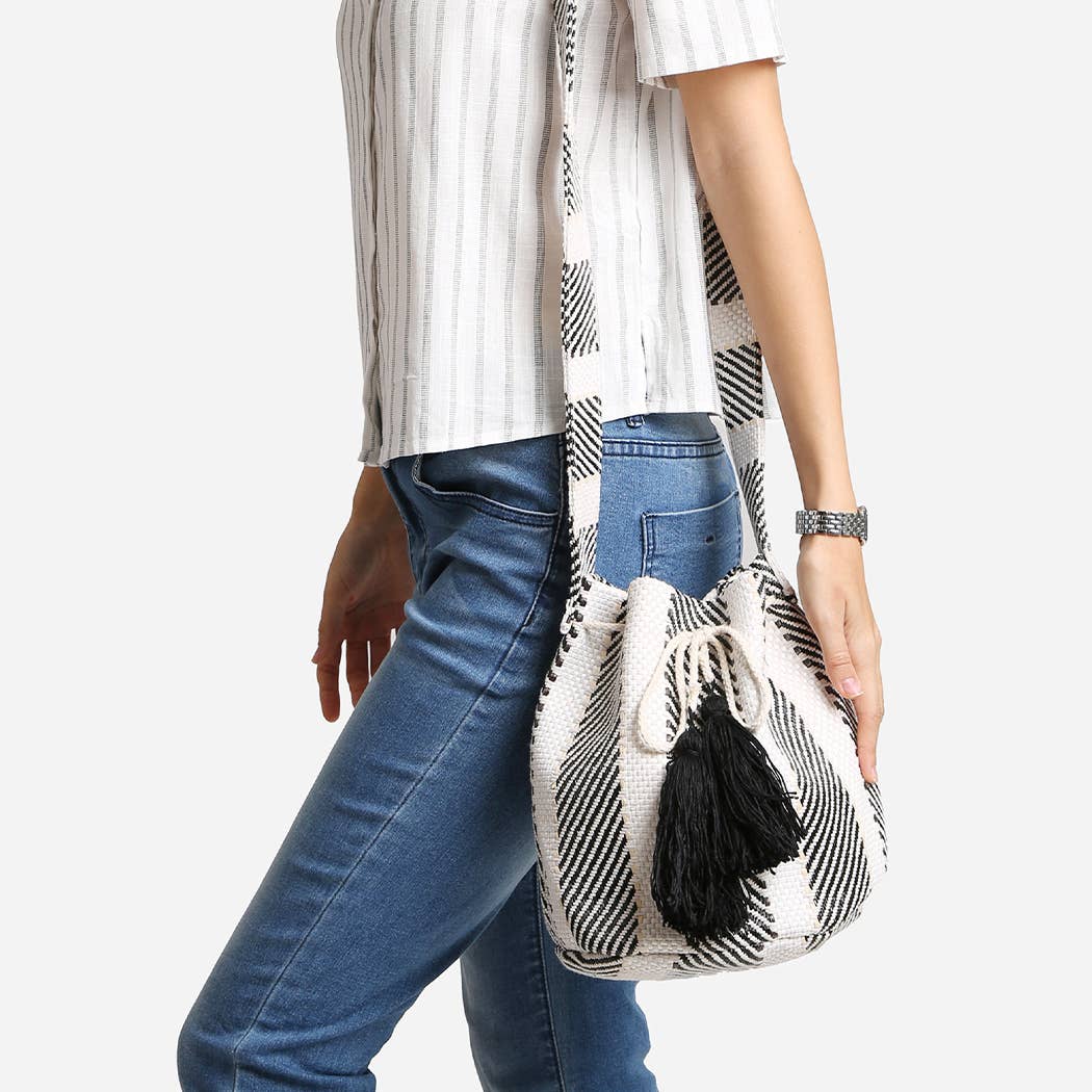 
                  
                    Slouchy Crossbody Bucket Bag with Tassels
                  
                