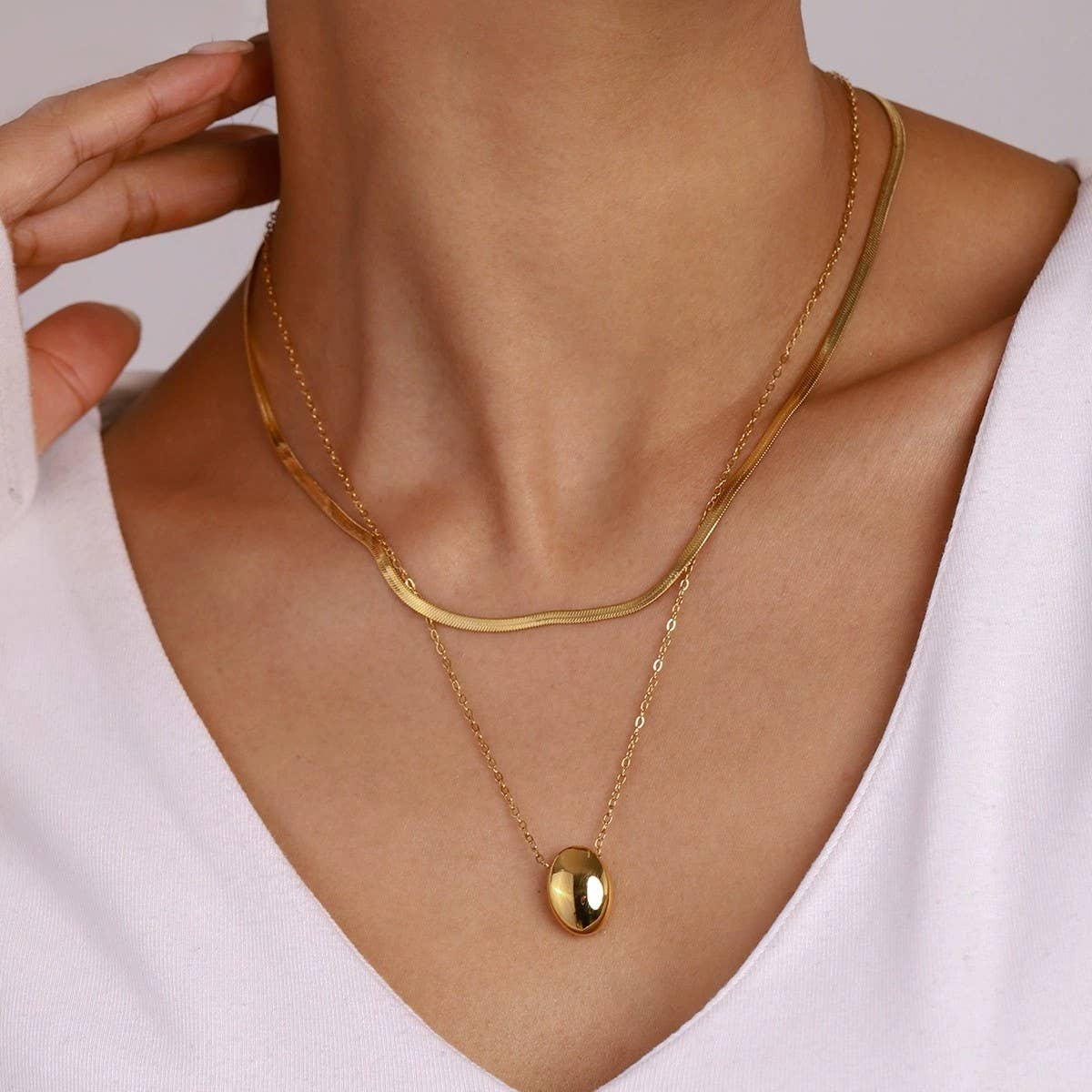 
                  
                    Bean and Herringbone Necklace Stack
                  
                