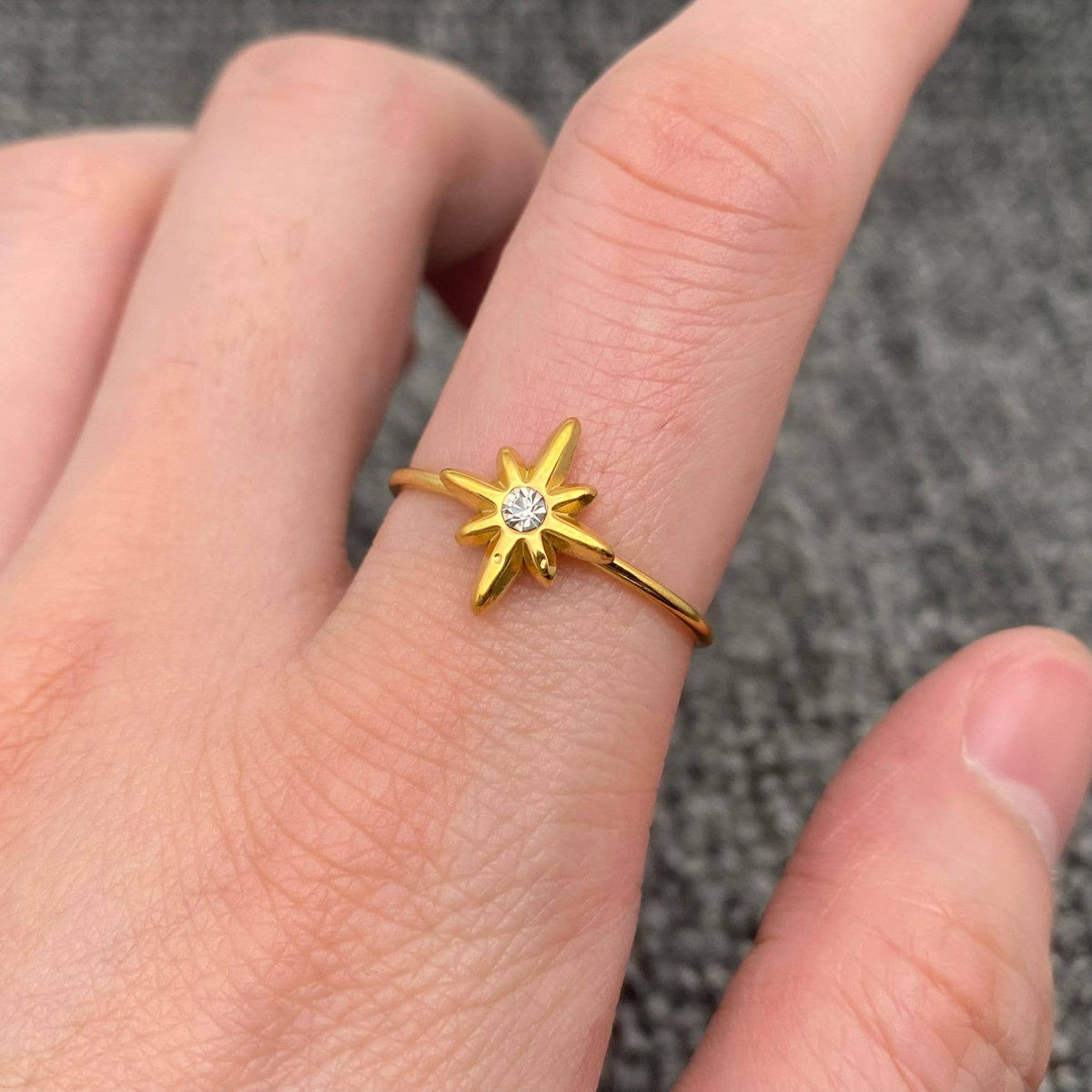 
                  
                    North Star CZ Inlaid Adjustable Ring
                  
                