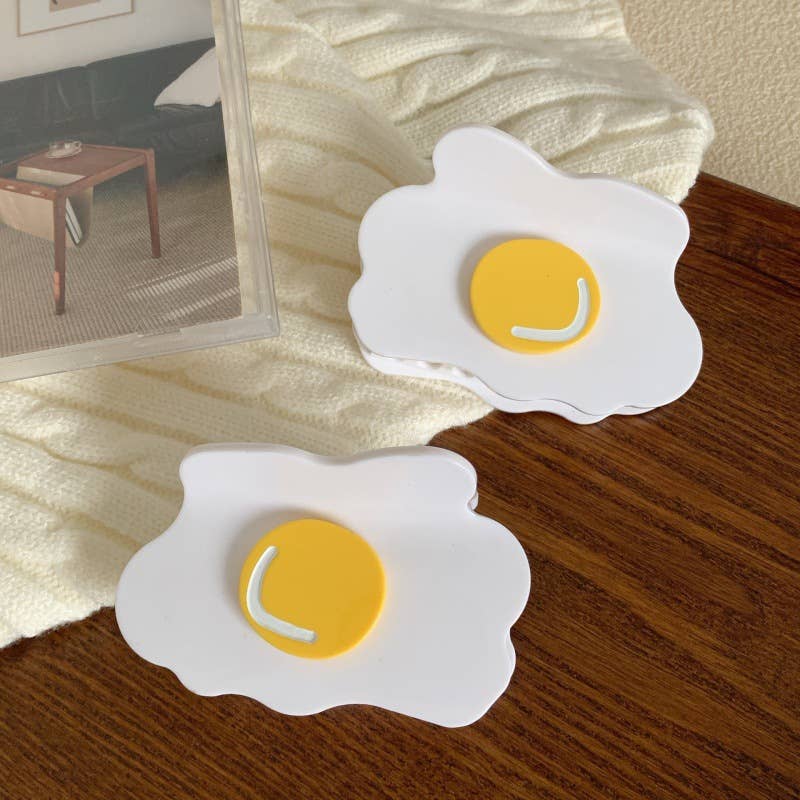 
                  
                    Fried Egg Hair Claw
                  
                