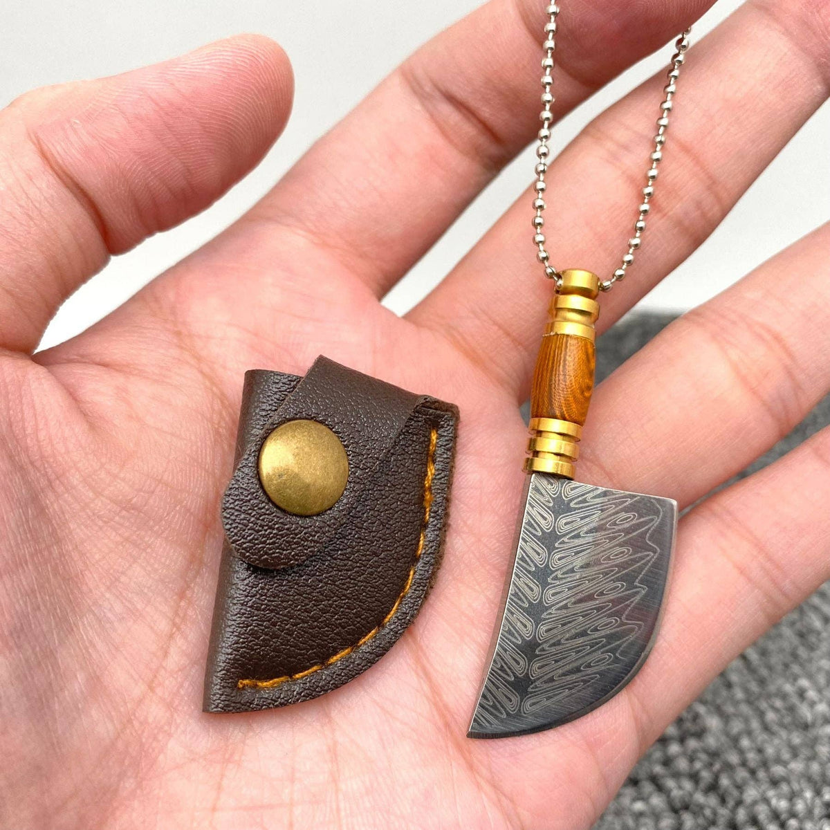
                  
                    Most Mini Damascus Pocket Knife With Protective Sheath
                  
                