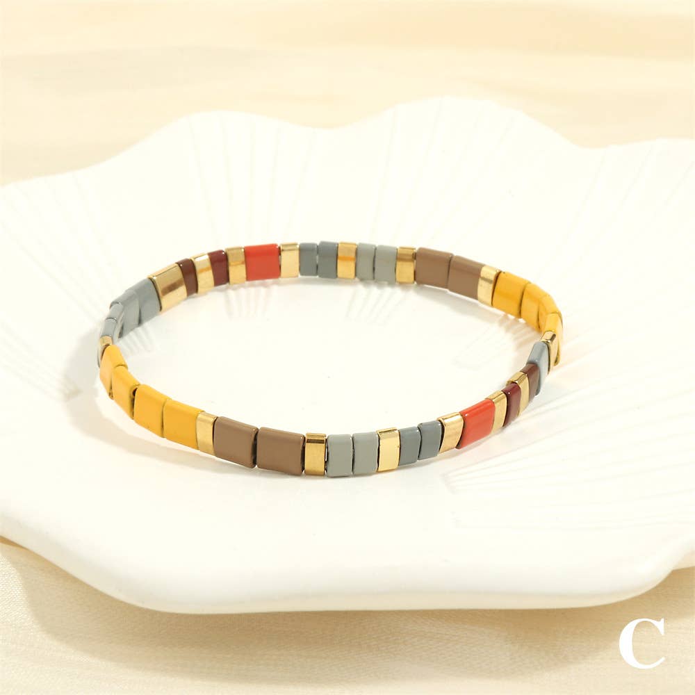 
                  
                    Glass TILA + Hematite Beaded Elastic Bracelets (Collection B)
                  
                