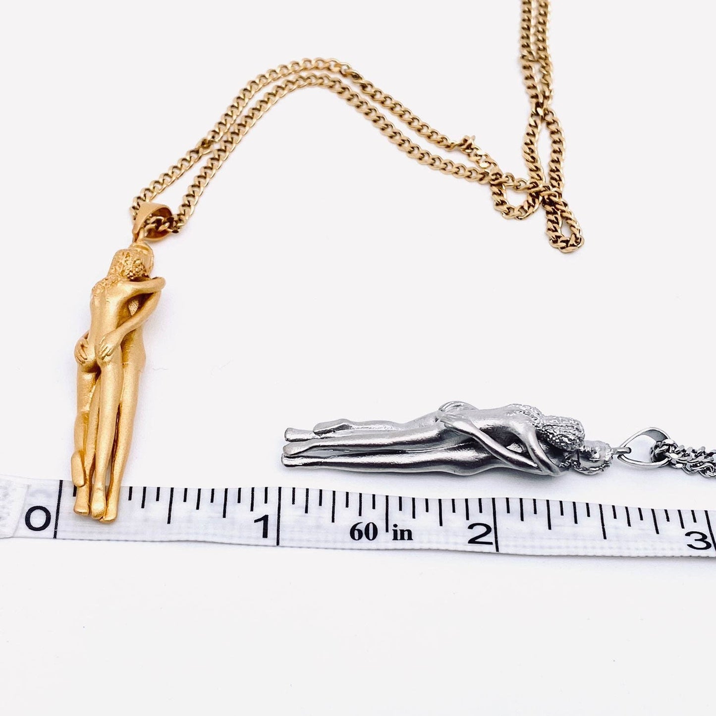 
                  
                    Embracing Lovers Charm Necklace
                  
                