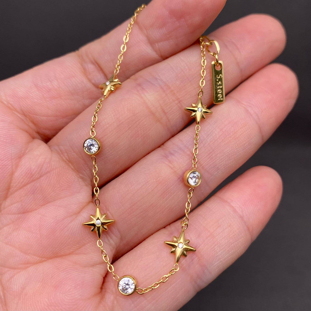 
                  
                    Zircon Inlaid Stars Bracelet
                  
                