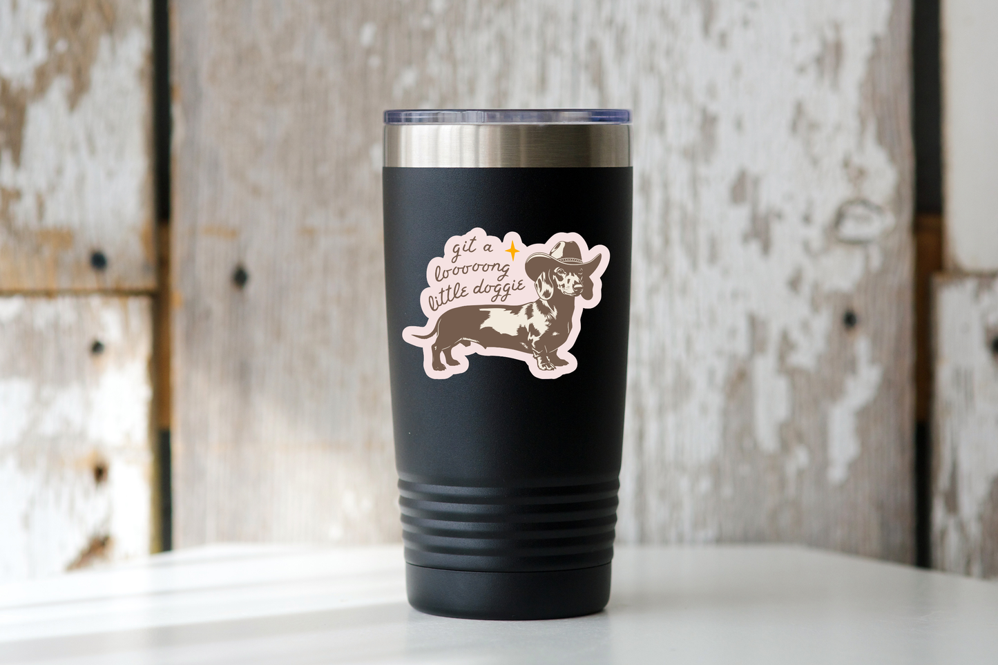 
                  
                    Git a Long Little Doggie Sticker
                  
                