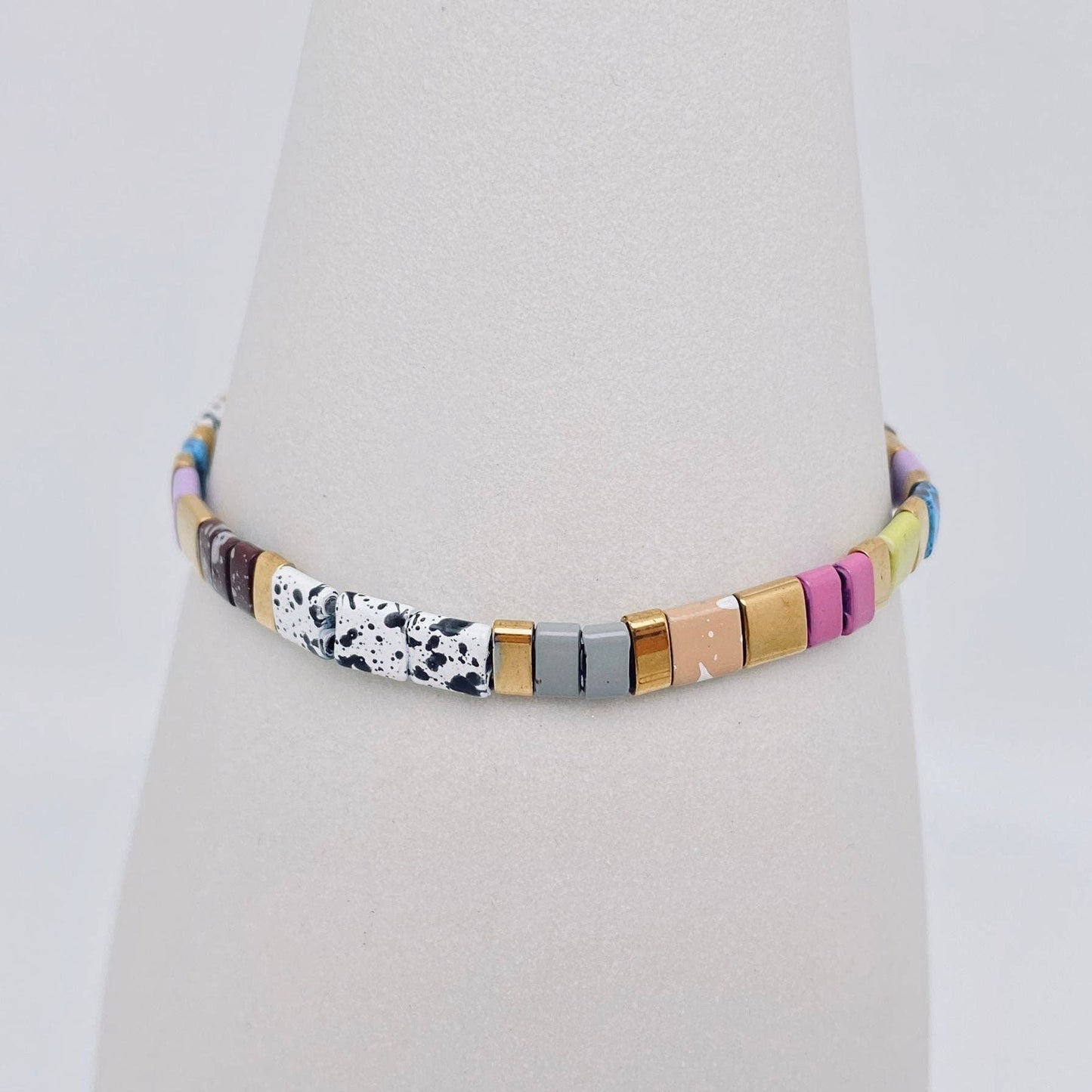 
                  
                    Glass TILA + Hematite Beaded Elastic Bracelets (Collection B)
                  
                