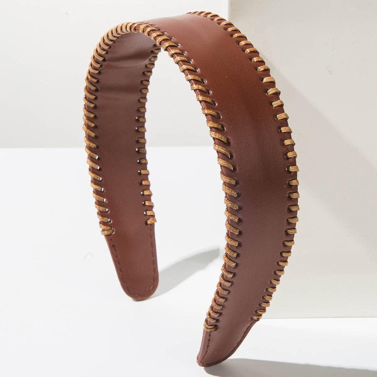 
                  
                    Wide Brim Leather Headband
                  
                