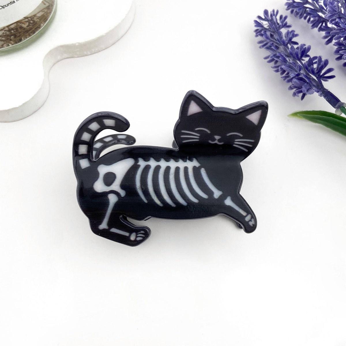 
                  
                    Skeleton Cat Hair Claw
                  
                