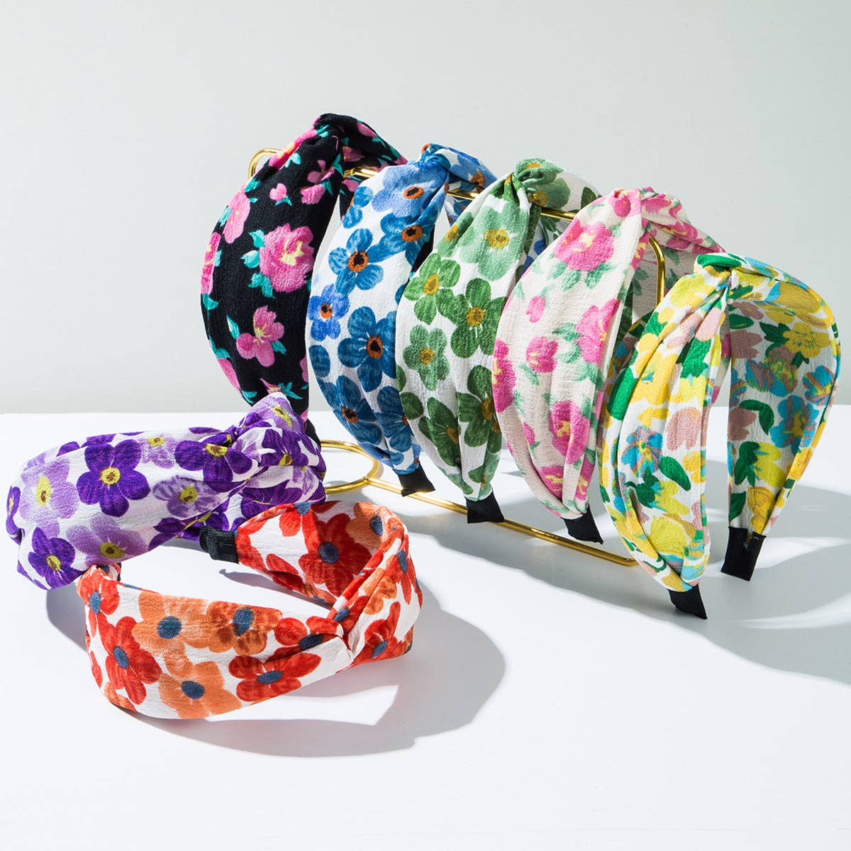
                  
                    Painterly Florals Twist Top Headband
                  
                