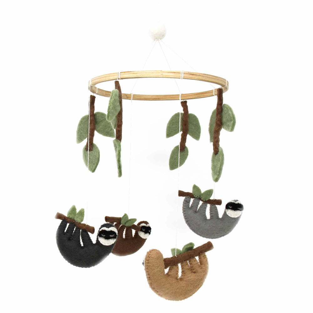 Felt crib mobile with four hanging sloths and hanging leaves around a natural wood frame