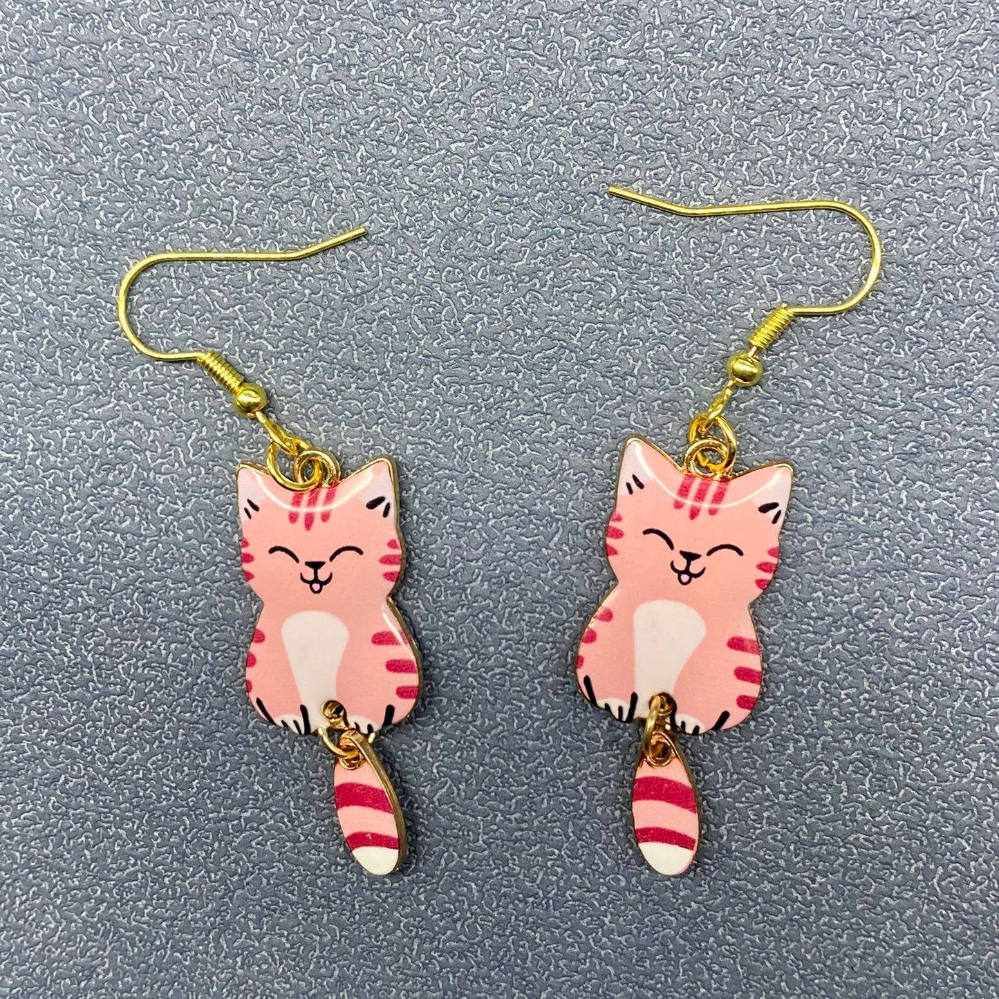 
                  
                    Swinging Tail Cat Earrings
                  
                