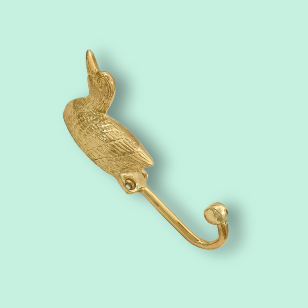 Solid brass forest animal coat hook in the shape of a swimming duck