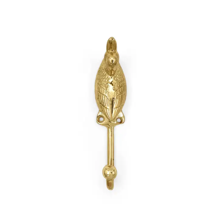 
                  
                    Duck forest animal coat hook in solid brass hanging from a wall
                  
                