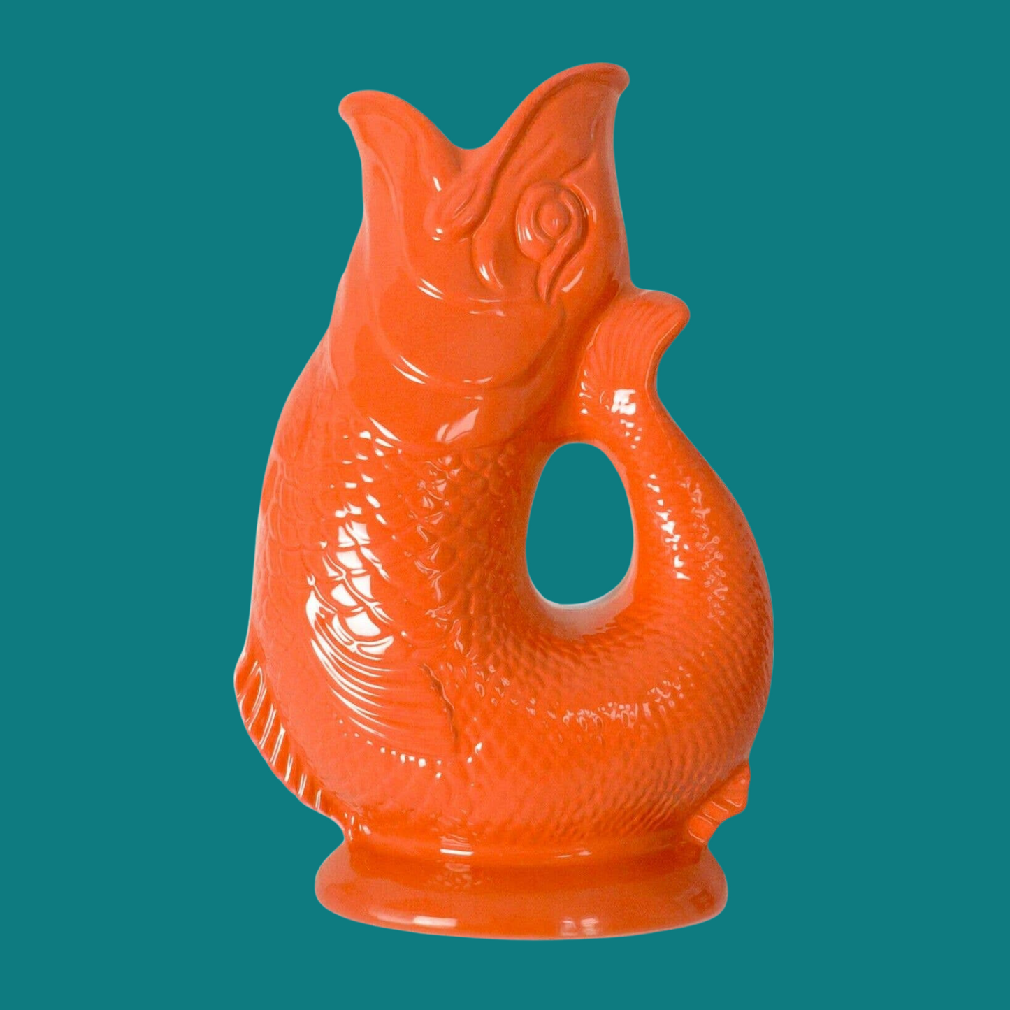 
                  
                    The gluggle jug original gurglepot fish pitcher in orange
                  
                