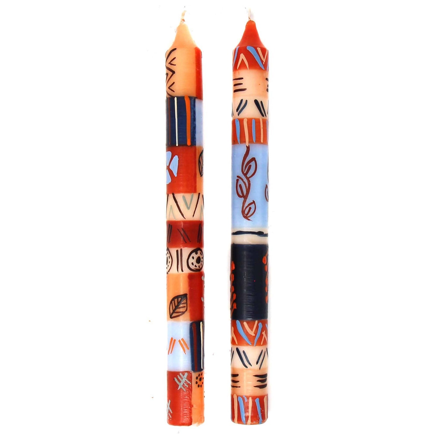 
                  
                    Two colorful patterned candles on a white background
                  
                