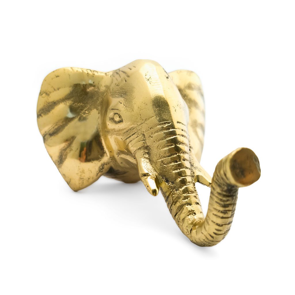 Solid brass elephant jungle animal coat hook with a long trunk as the hook