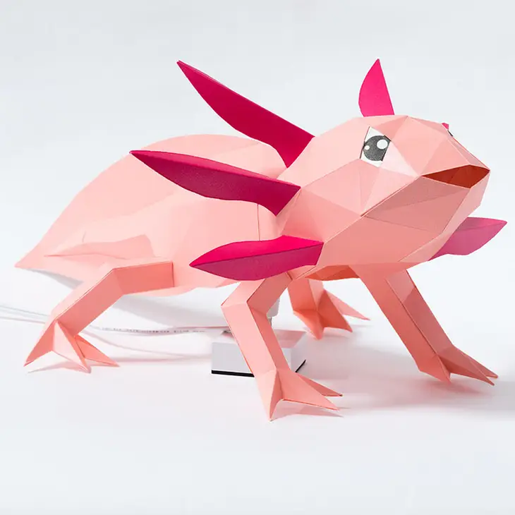 Paper axolotl, made using a template for kirigami art for beginners