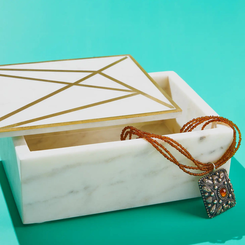 
                  
                    White and Gold Marble Box
                  
                