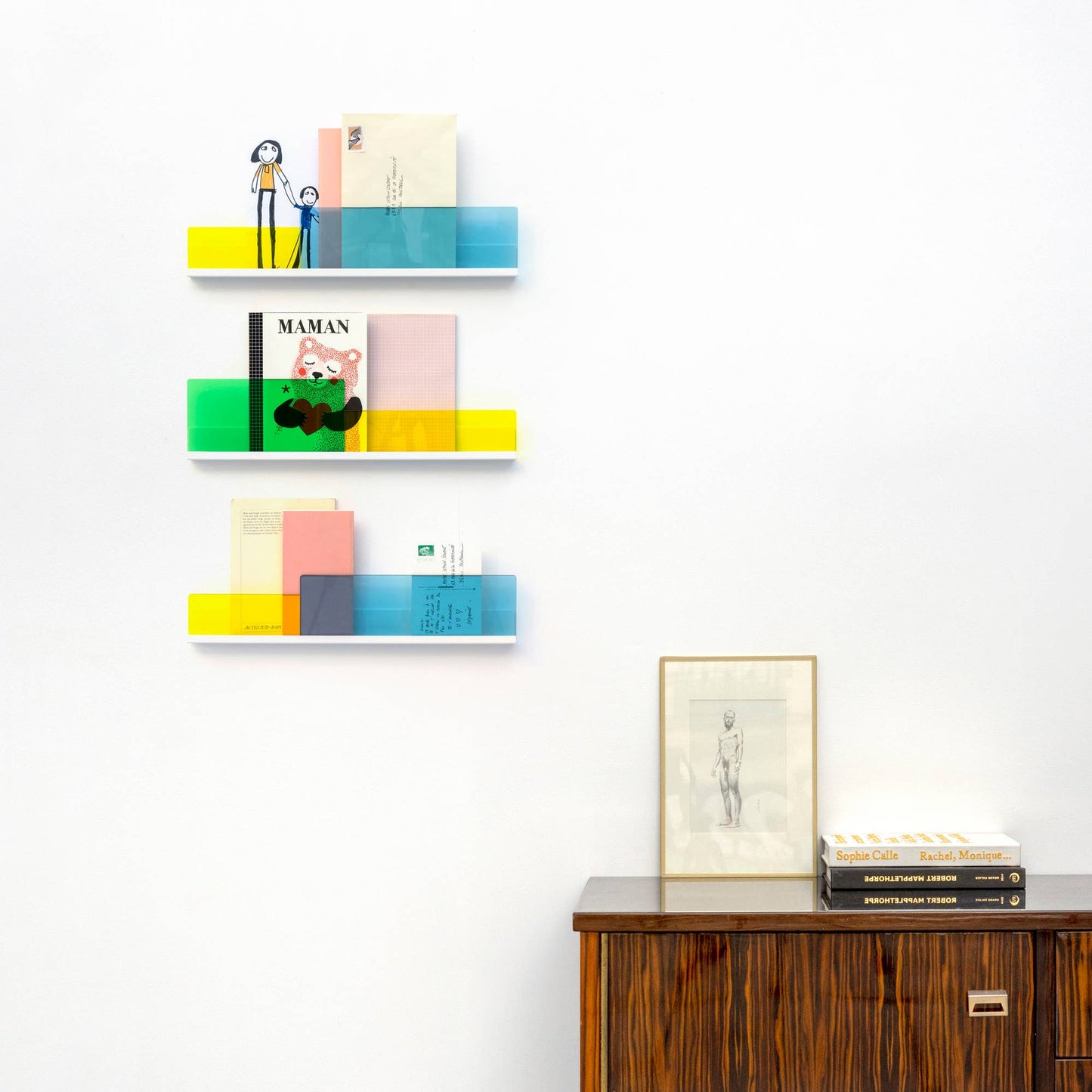 
                  
                    Floating shelves with bright bold colorful acrylic panes
                  
                