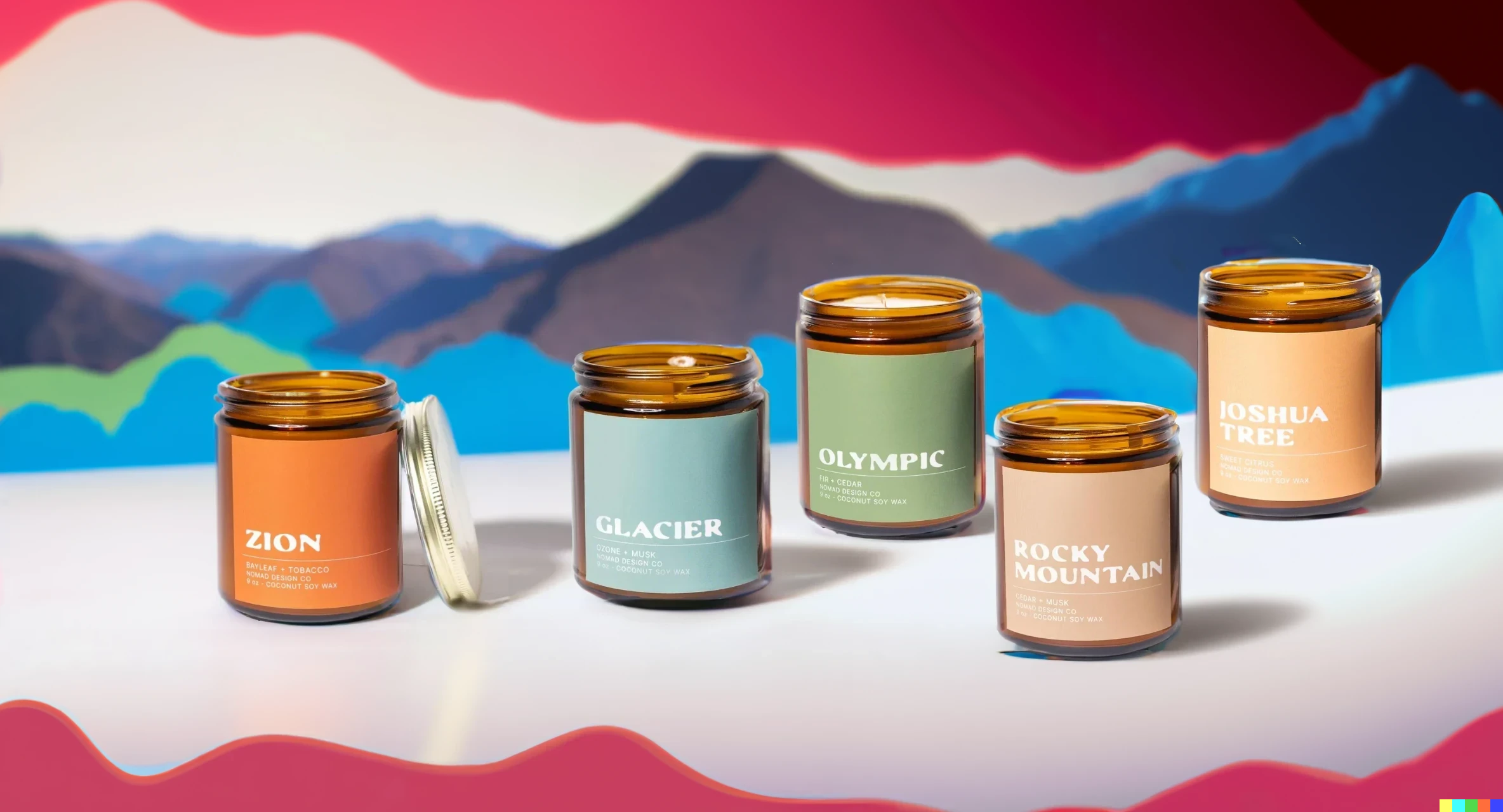 A collection of national park candles, showing Zion, Glacier, Olympic, Rocky Mountain, and Joshua Tree National Park candles together on a table.