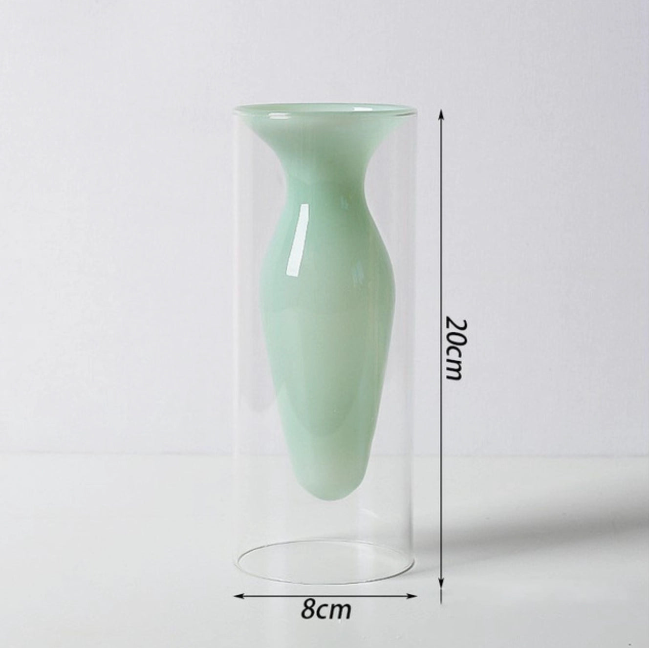 
                  
                    Double layer nordic glass vase in milky green
                  
                