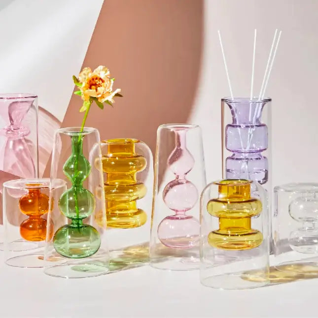 Nordic glass vase collection in transparent colors and geometric shapes