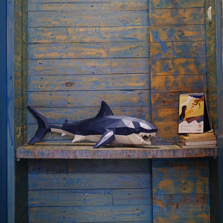 Shark 3D DIY kirigami art for beginners, assembled and shown on a display shelf