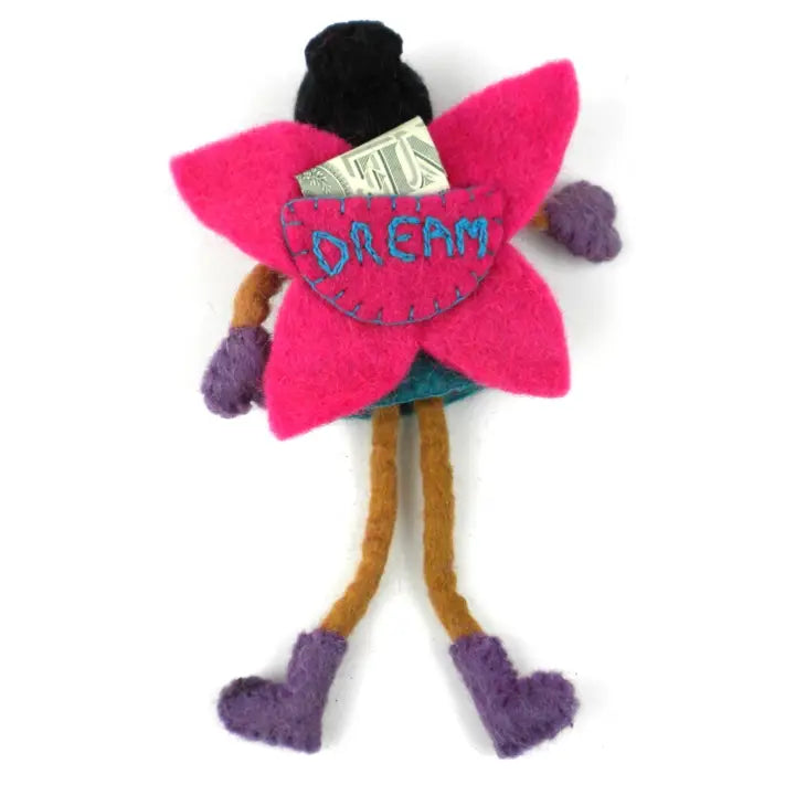 Felt tooth fairy pillow with black hair, pink wings, and a back pocket for holding tooth fairy notes