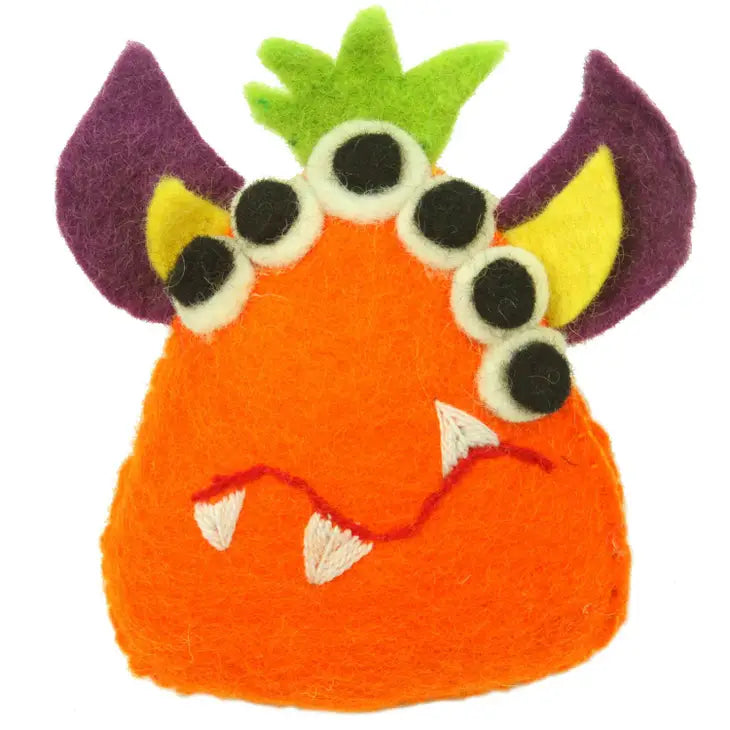 
                  
                    Orange monster tooth fairy pillow boy style made from felt with six eyes, purple felt horns and teeth
                  
                